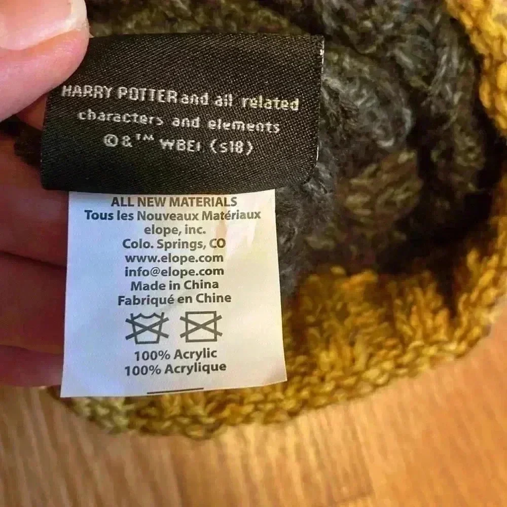 Harry Potter Hufflepuff Knit Beanie With PomPom in Size Youth.  Gray and Yellow.